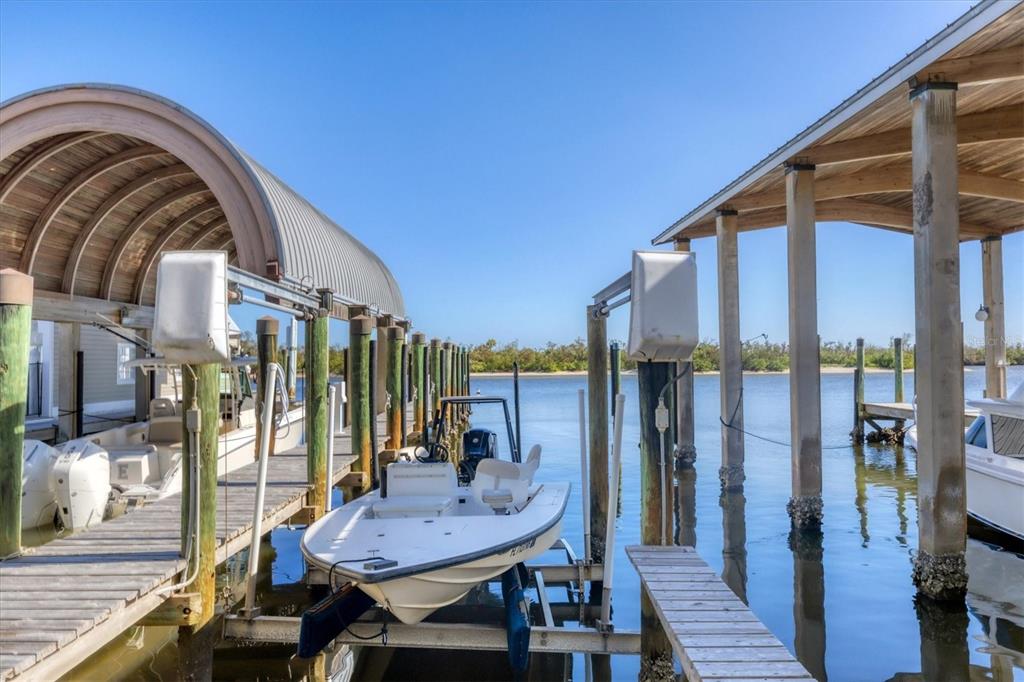 208 Harbor Drive Boca Grande, FL 33921 - Photo 41 of 53 a view of a balcony with furniture and wooden floor