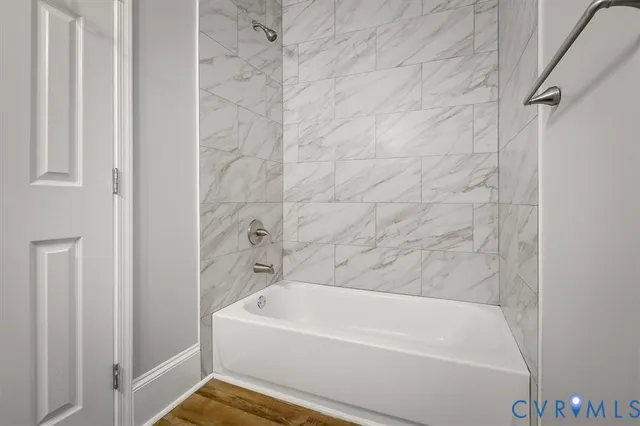 a view of a bathroom with a tub