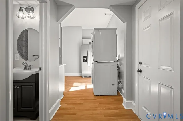 a view of a bathroom from the hallway