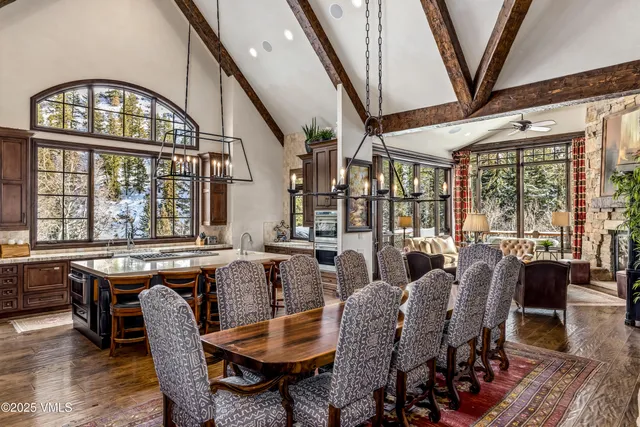 a bathroom with a double vanity sink mirror and shower