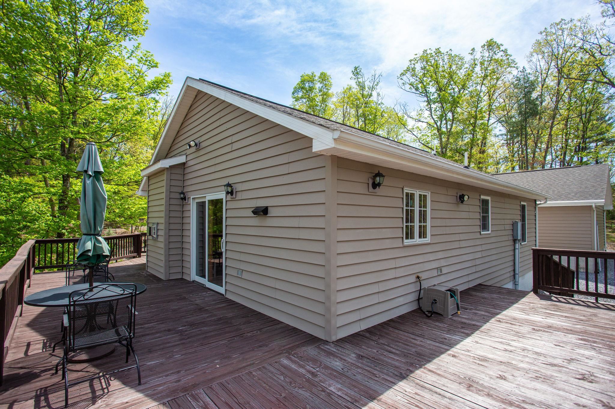 324 Mountaintop Drive Mathias, WV 26812 - Photo 20 of 27 Wrap Around Deck