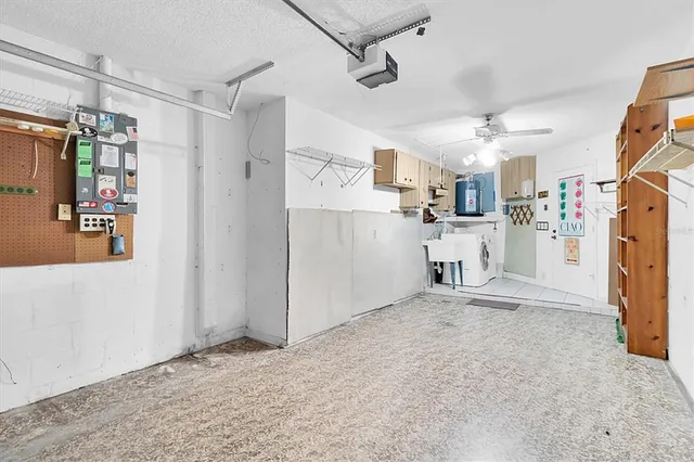 a view of a house with backyard and garden