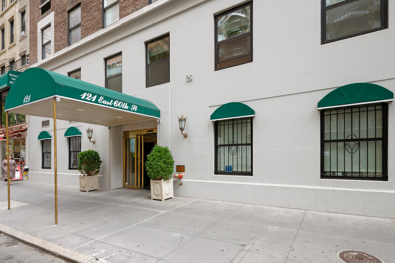 121 East 60th Street, Unit 3B Manhattan, NY 10022 - Photo 10 of 11 a view of a house with entrance gate