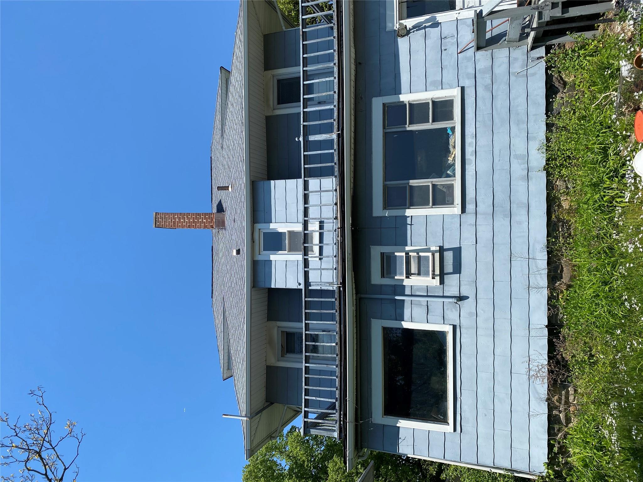 196 Elm Street New Rochelle, NY 10805 - Photo 4 of 5 a view of a house with balcony