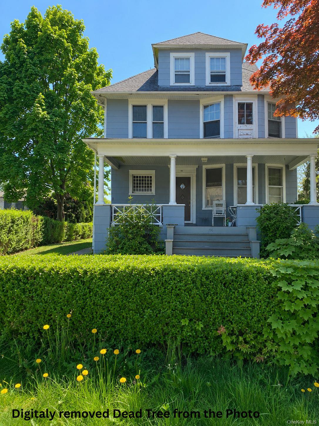 196 Elm Street New Rochelle, NY 10805 - Photo 5 of 5 a front view of a house with a yard
