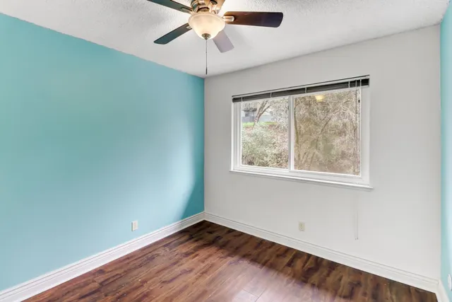 a bathroom with a glass shower door