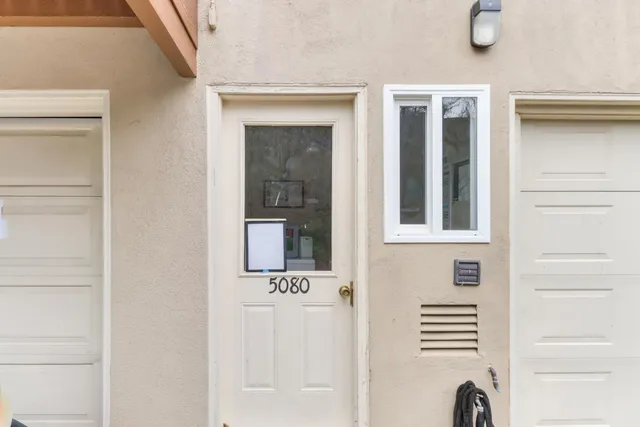 a car parked in front of a house