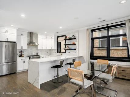 $649,000 | 4040 North Mozart Street, Unit 2, Chicago, IL 60618