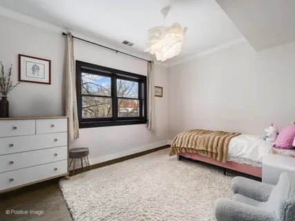 $649,000 | 4040 North Mozart Street, Unit 2, Chicago, IL 60618