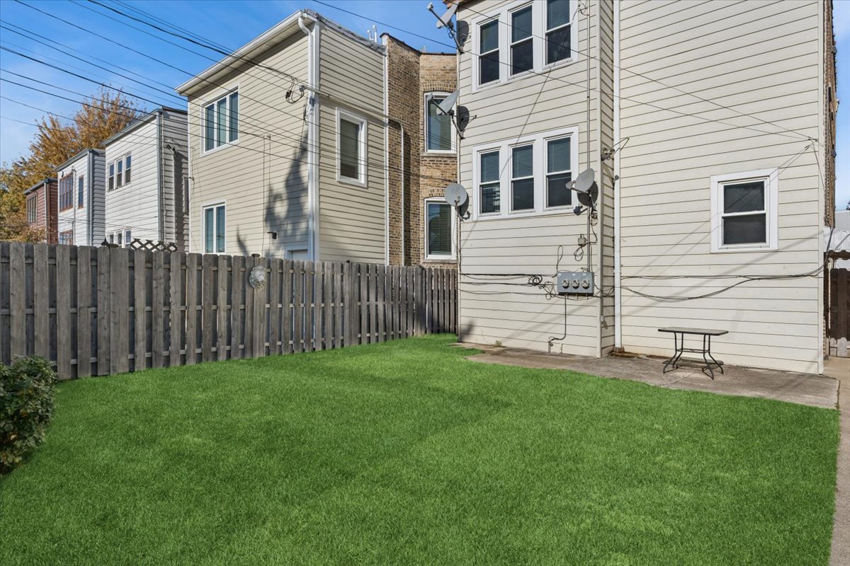 5033 West Cullom Avenue, Unit 1 Chicago, IL 60641 - Photo 20 of 20 a view of a back yard of the house