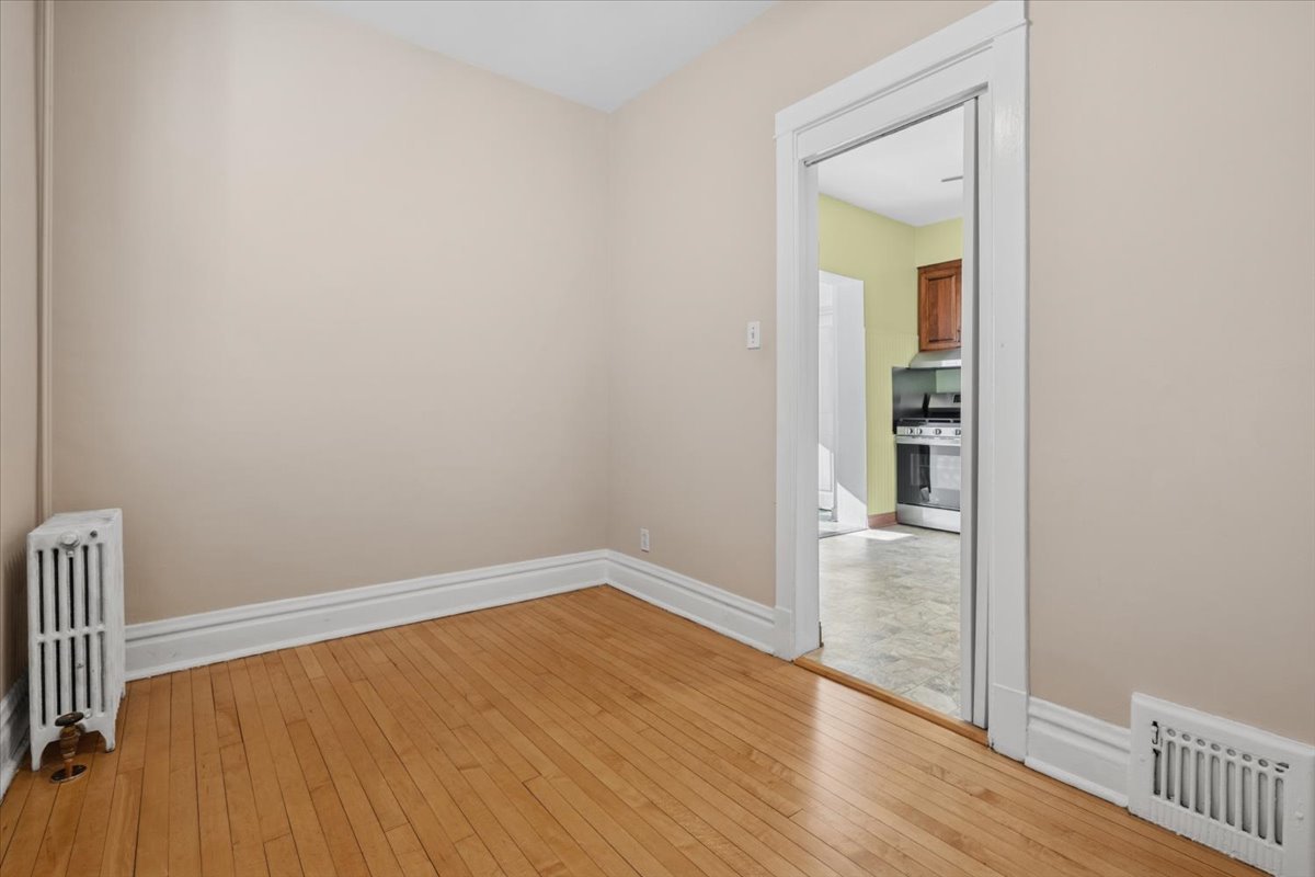 5033 West Cullom Avenue, Unit 1 Chicago, IL 60641 - Photo 10 of 20 wooden floor in a gallery