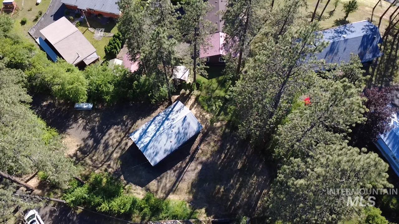 151 View Road Kamiah, ID 83536 - Photo 46 of 49 Property featuring a detached structure with a pitched roof, surrounded by mature trees