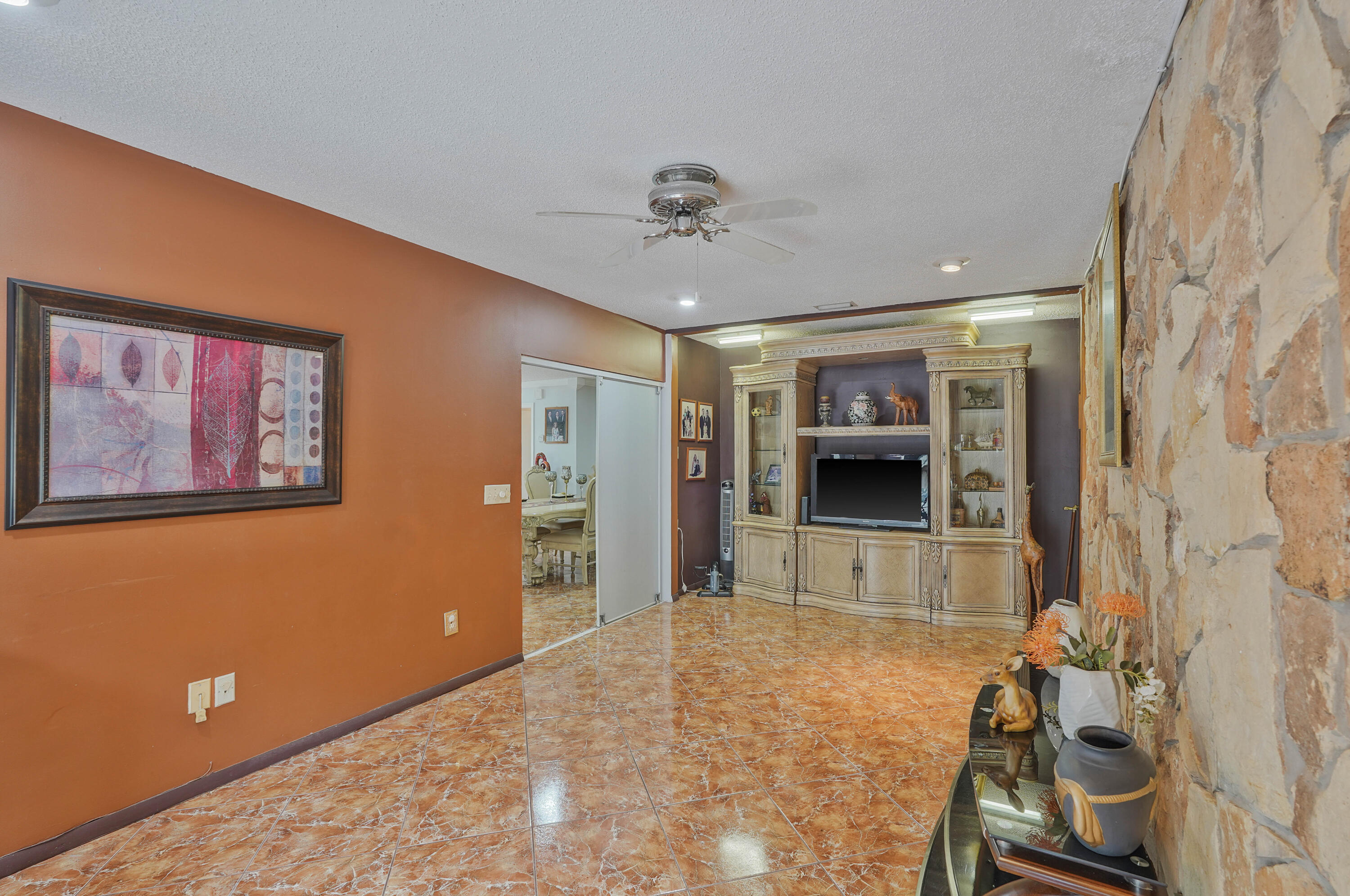 7512 Ace Road North Lake Worth, FL 33467 - Photo 13 of 25 a view of an empty room with window and cabinet