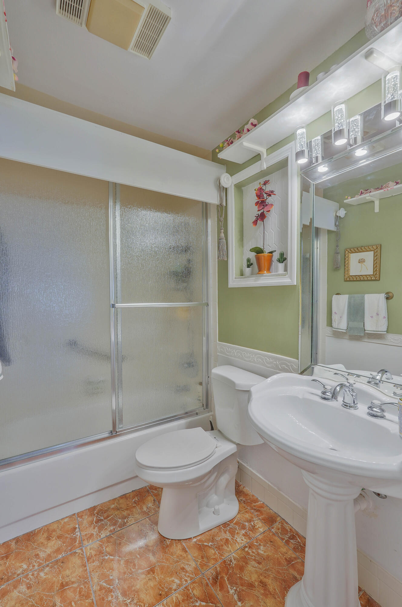 7512 Ace Road North Lake Worth, FL 33467 - Photo 14 of 25 a bathroom with a sink toilet and shower