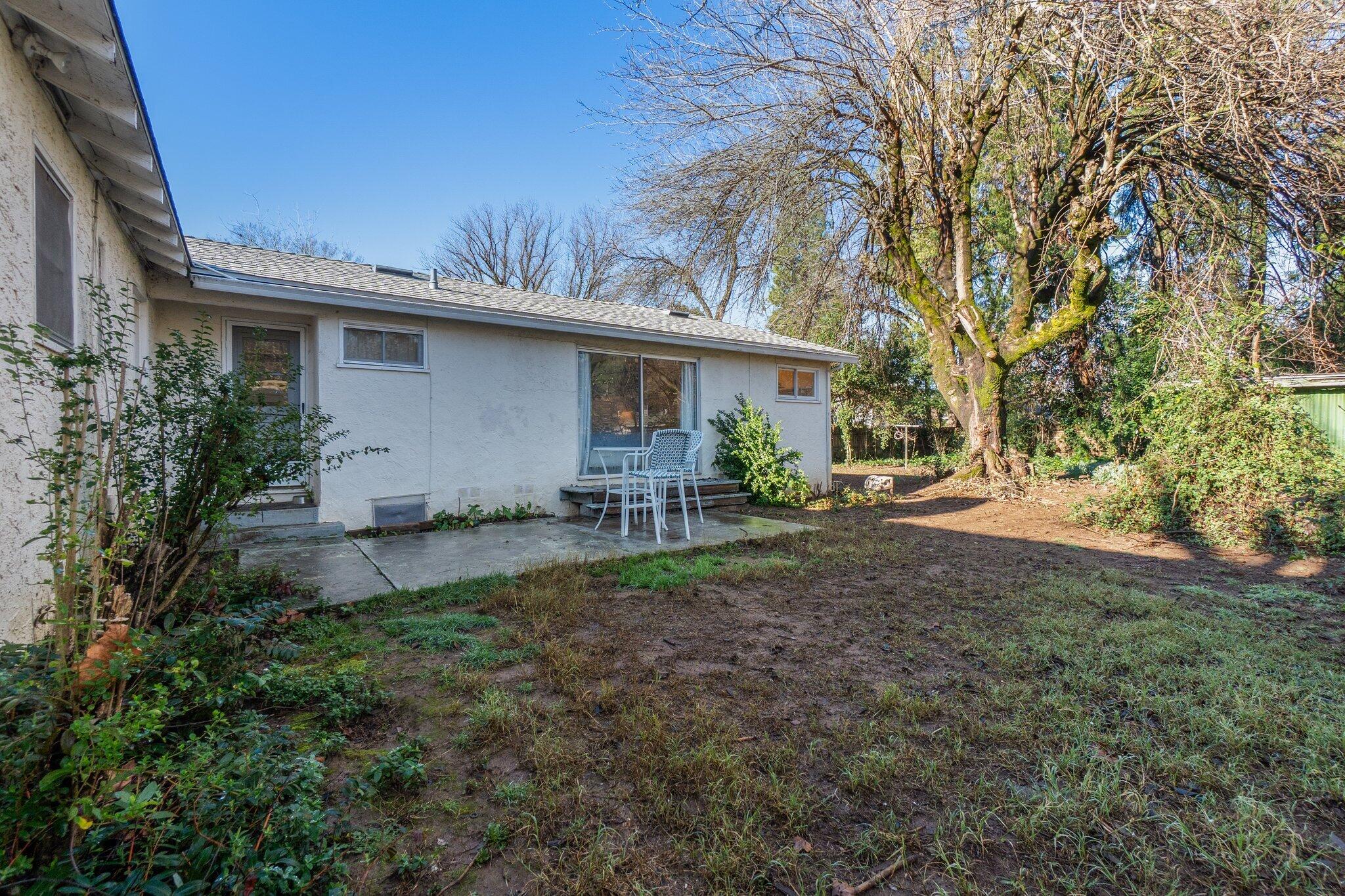 686 Coronado Street Redding, CA 96003 - Photo 25 of 39 a house view with a backyard space
