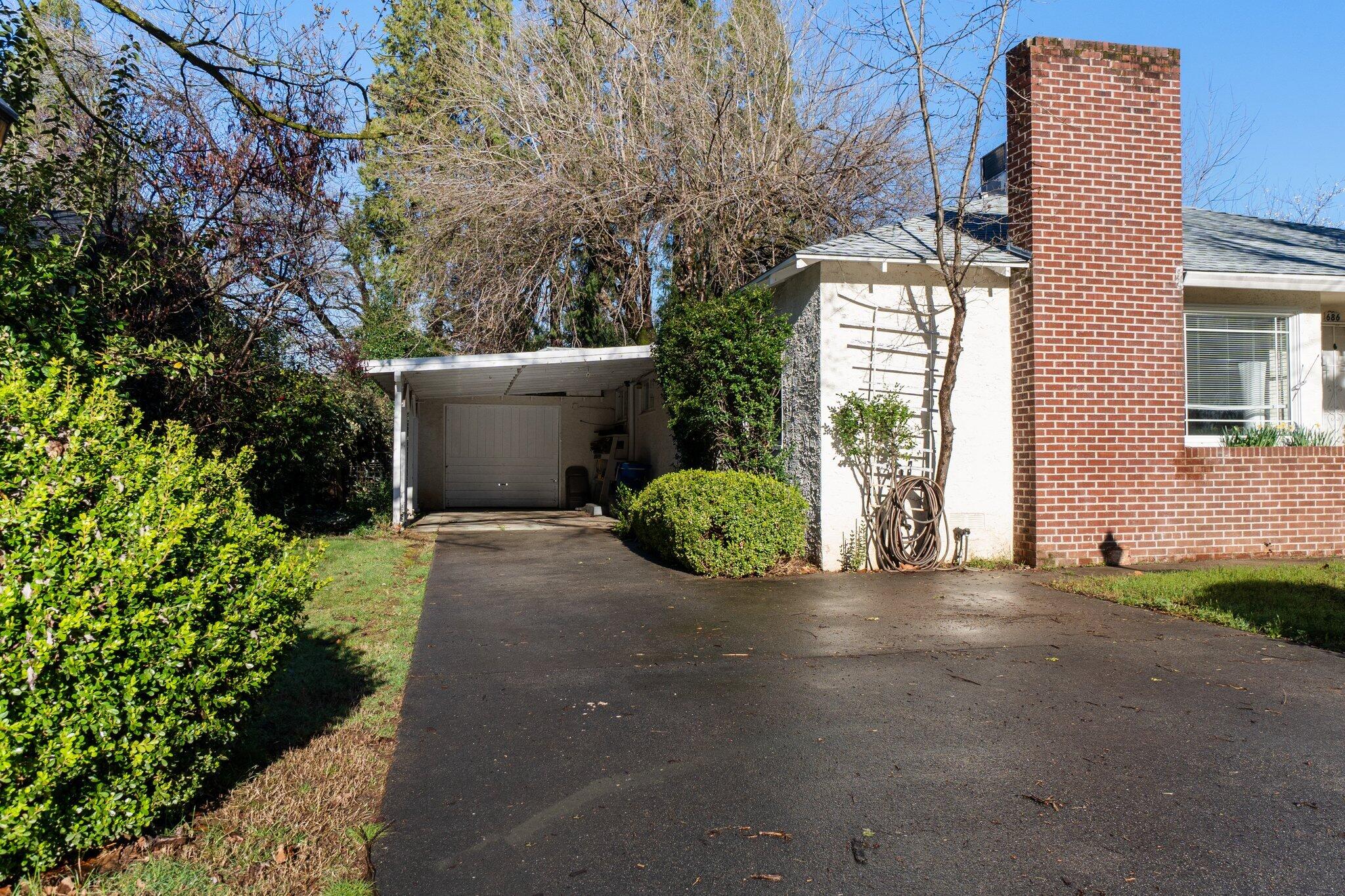 686 Coronado Street Redding, CA 96003 - Photo 3 of 39 a view of a back yard of the house