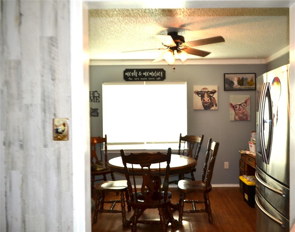 7331 Taylor Ranch Loop Kaufman, TX 75142 - Photo 21 of 34 a view of a dining room with furniture and a window