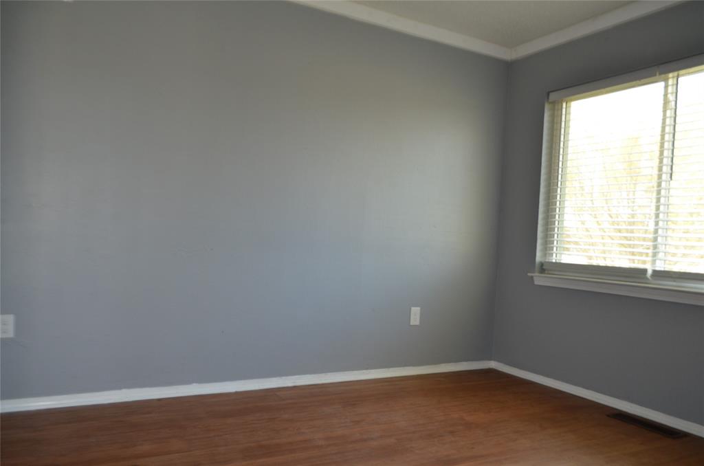 7331 Taylor Ranch Loop Kaufman, TX 75142 - Photo 33 of 34 an empty room with a window