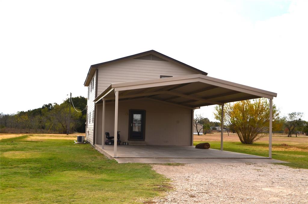 7331 Taylor Ranch Loop Kaufman, TX 75142 - Photo 4 of 34 a view of a house with a yard