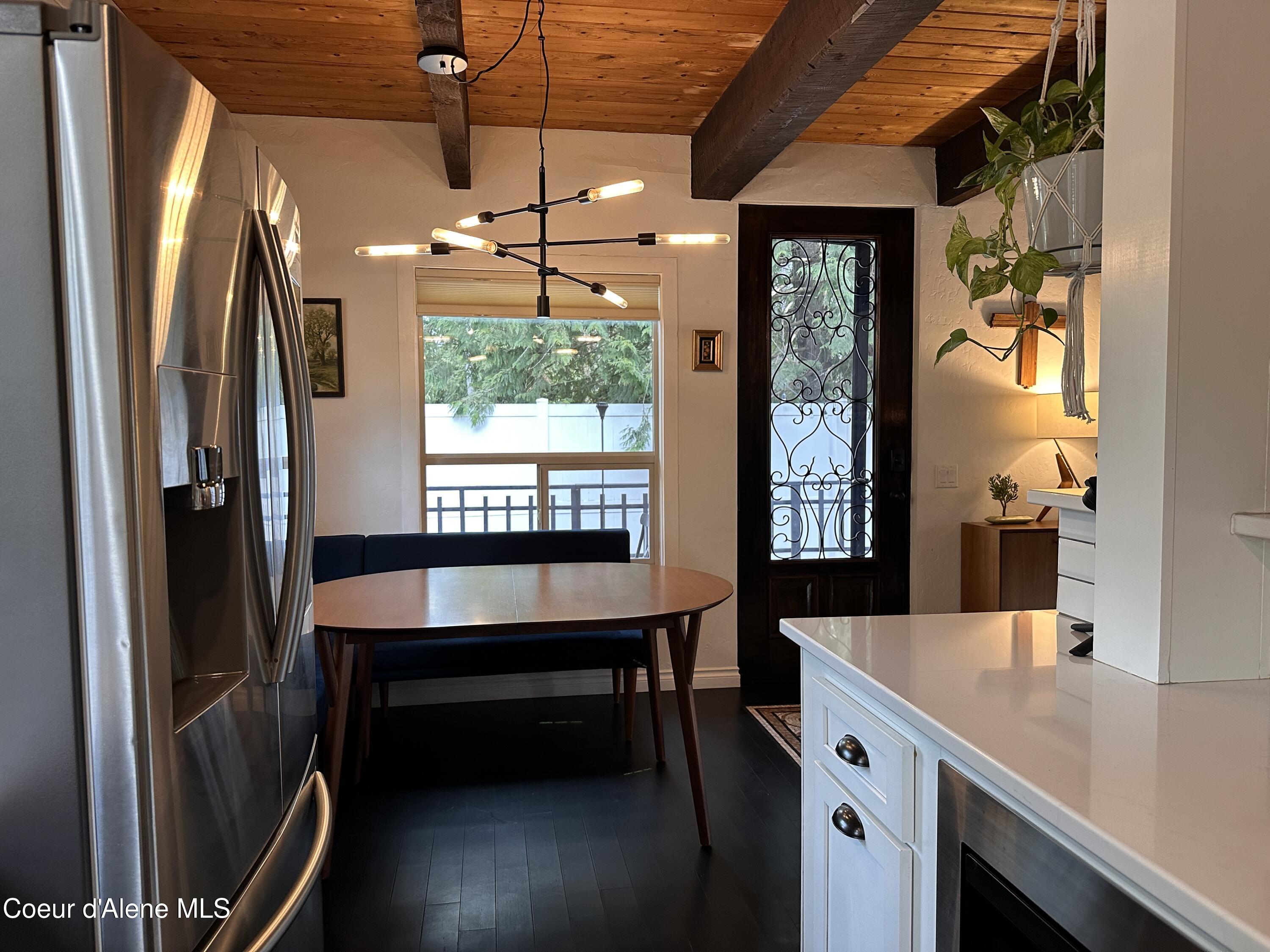 2727 Selkirk Road Sandpoint, ID 83864 - Photo 15 of 68 KitchentoDiningFrontDoor