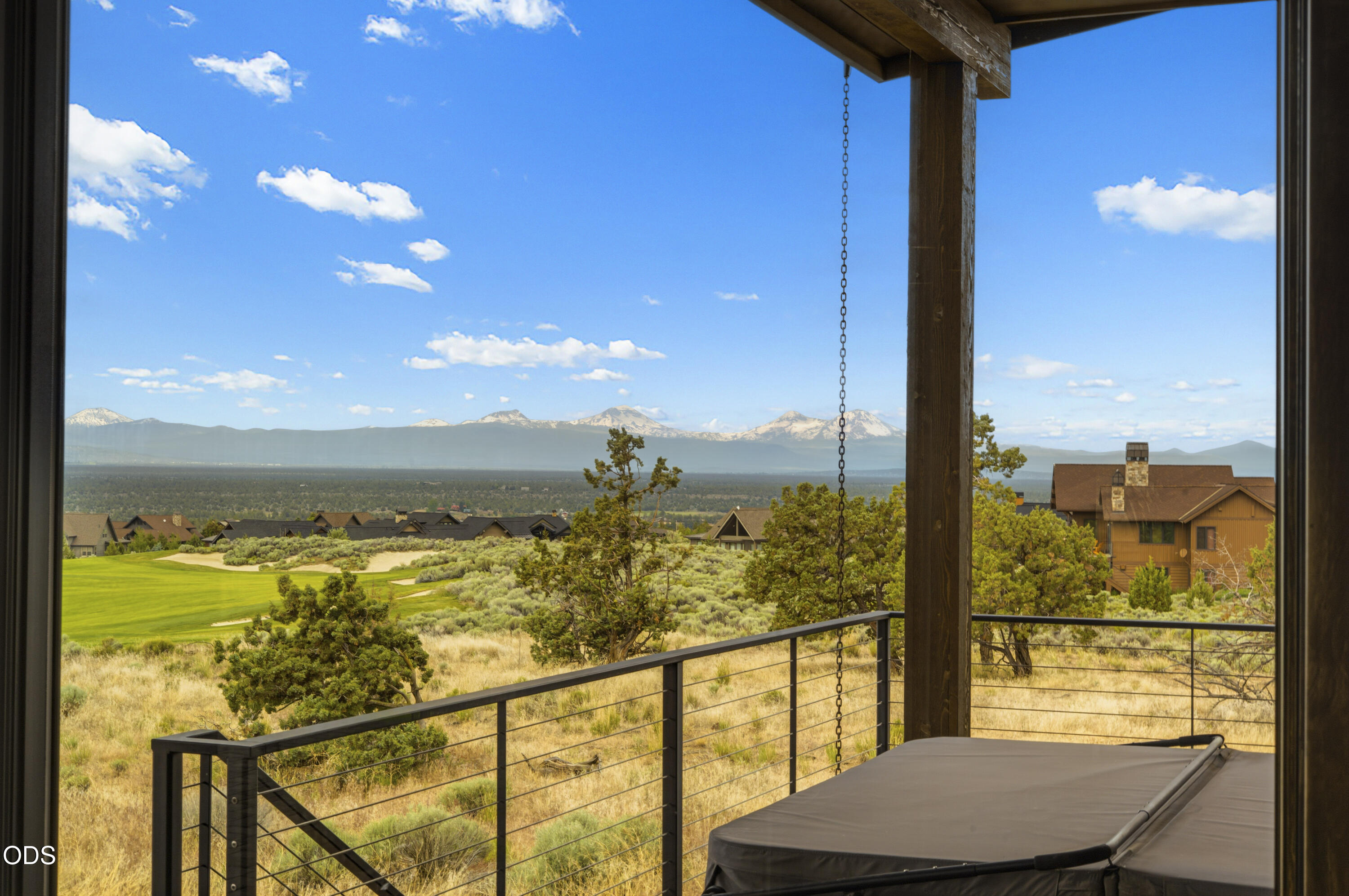 15935 South W Brasada Ranch Road Powell Butte, OR 97753 - Photo 36 of 45 a view of a balcony with chair and lake view