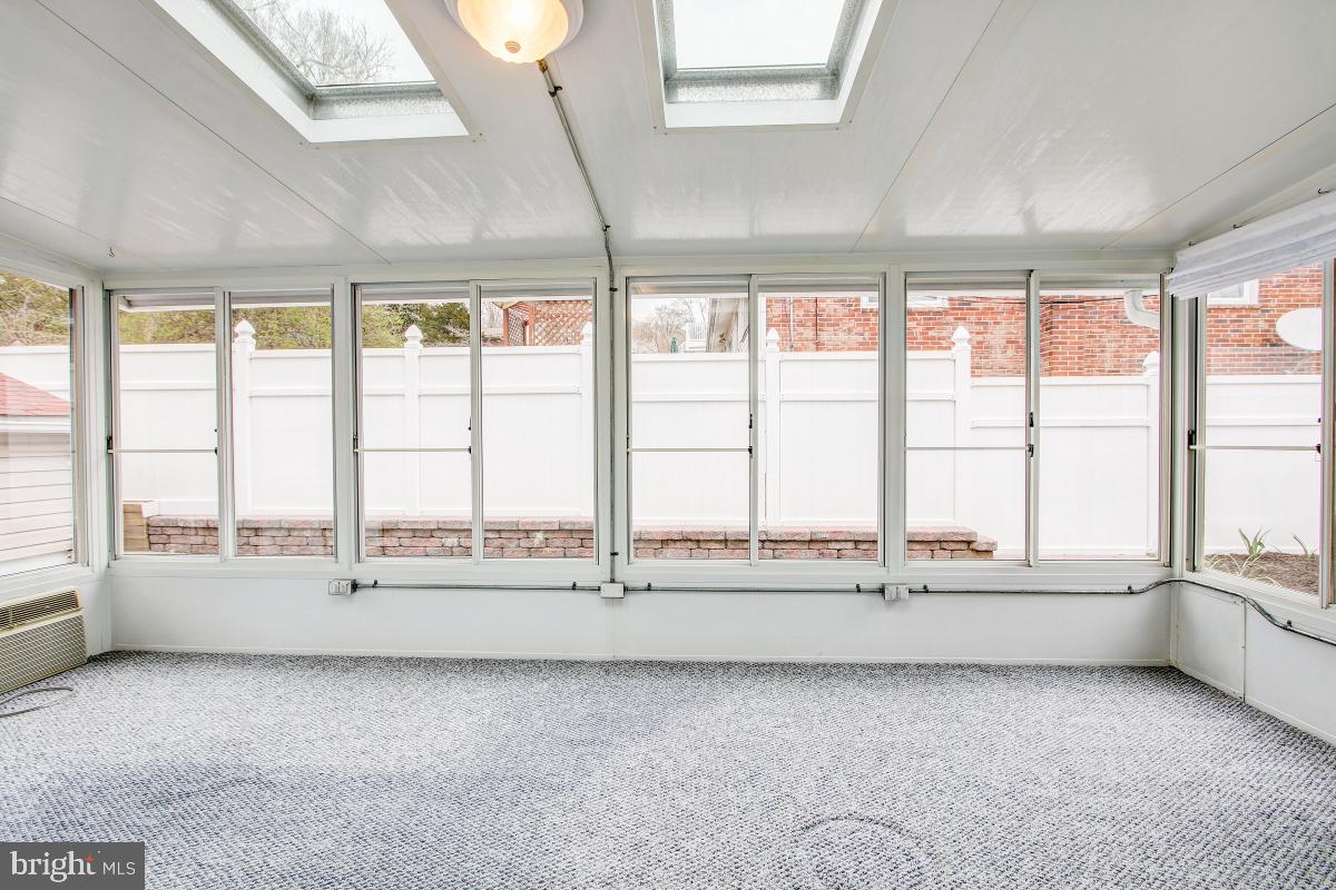 12501 Littleton Street Silver Spring, MD 20906 - Photo 14 of 33 Sunroom with skylights and separate hvac unit.