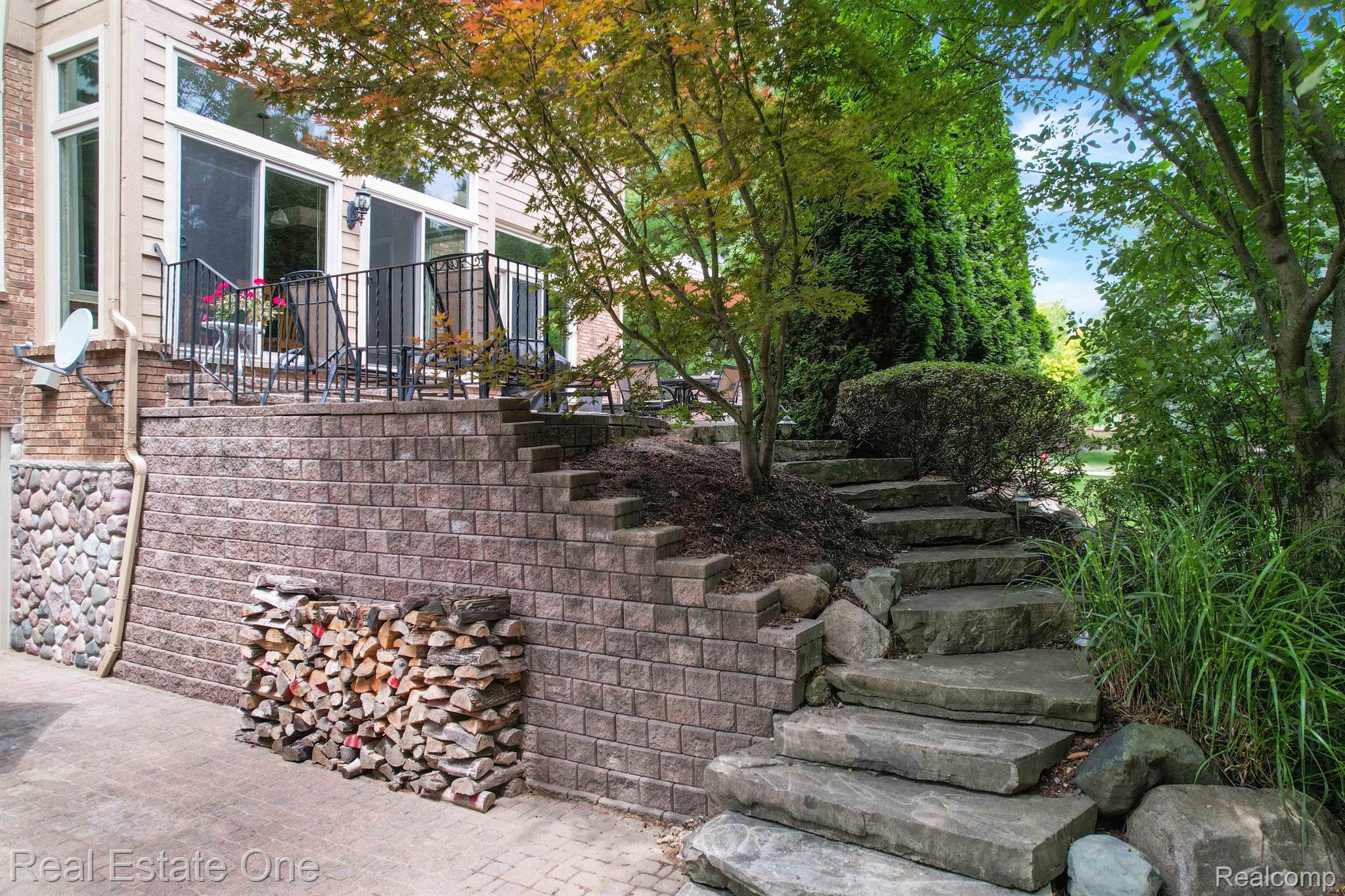 1938 Grayslake Drive Rochester, MI 48306 - Photo 63 of 65 Stone steps between patios