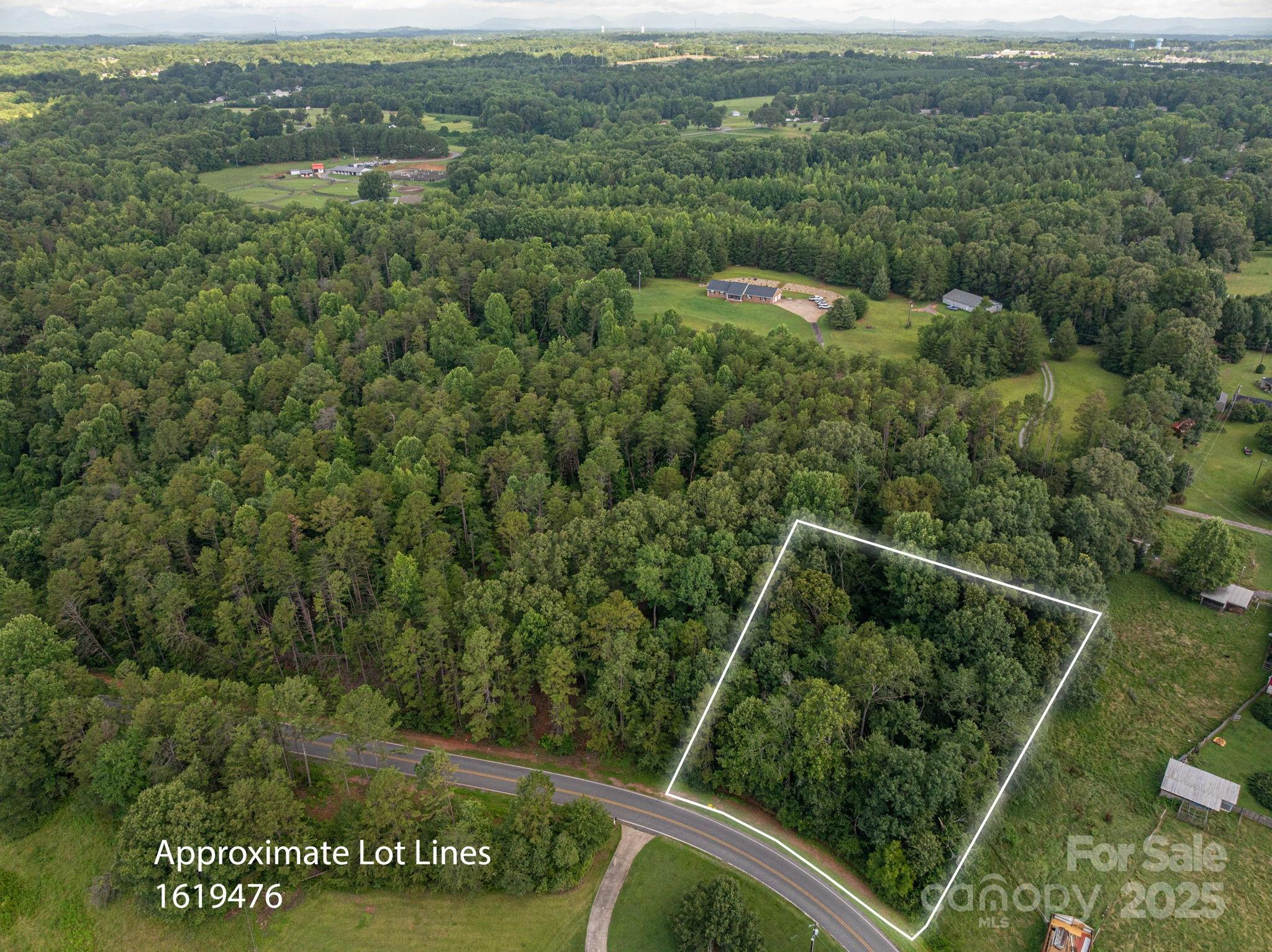 Lot 12 McDade Road Forest City, NC 28043 - Photo 1 of 10 a view of a city from a balcony