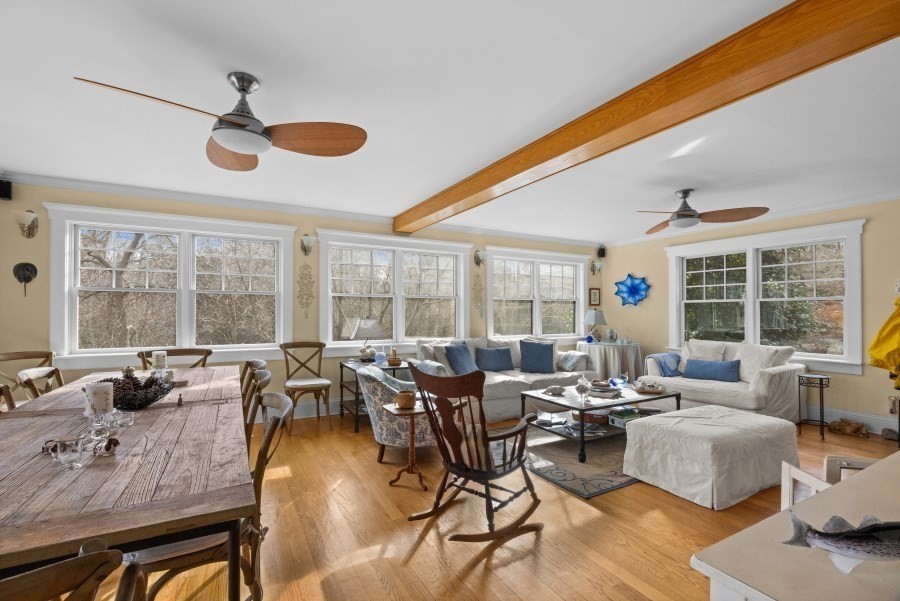 61 Causeway Road Tisbury, MA 02568 - Photo 11 of 42 a very nice looking living room with furniture and a large window