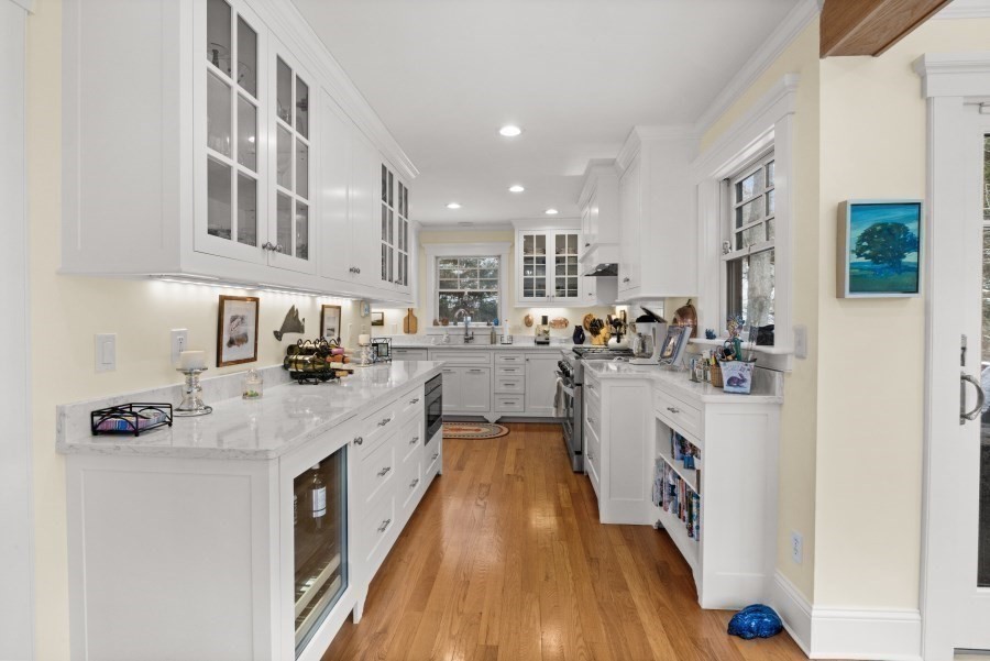 61 Causeway Road Tisbury, MA 02568 - Photo 14 of 42 a kitchen with stainless steel appliances granite countertop a stove and a sink