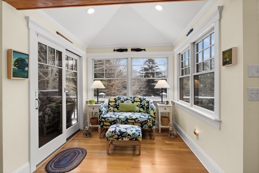 61 Causeway Road Tisbury, MA 02568 - Photo 17 of 42 a living room with furniture large window and wooden floor