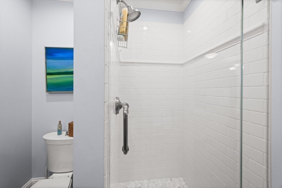 61 Causeway Road Tisbury, MA 02568 - Photo 21 of 42 a bathroom with a shower a toilet and a sink