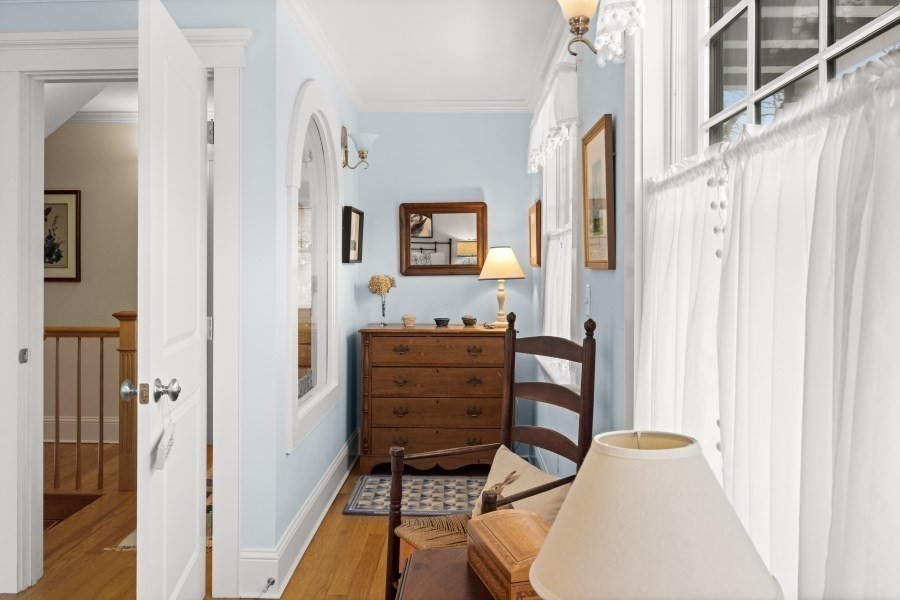 61 Causeway Road Tisbury, MA 02568 - Photo 24 of 42 a view of a bedroom with furniture and wooden floor