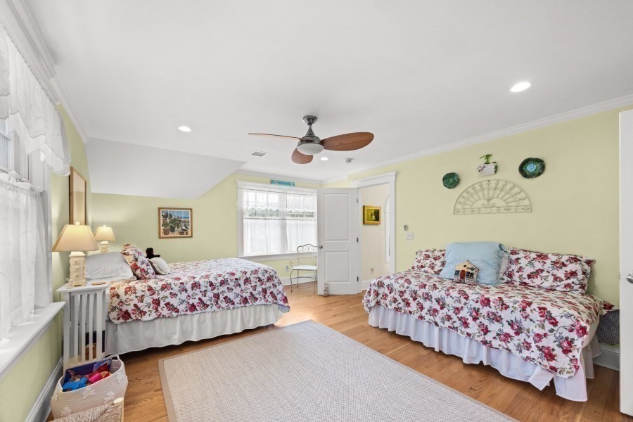 61 Causeway Road Tisbury, MA 02568 - Photo 28 of 42 a bedroom with a bed and window