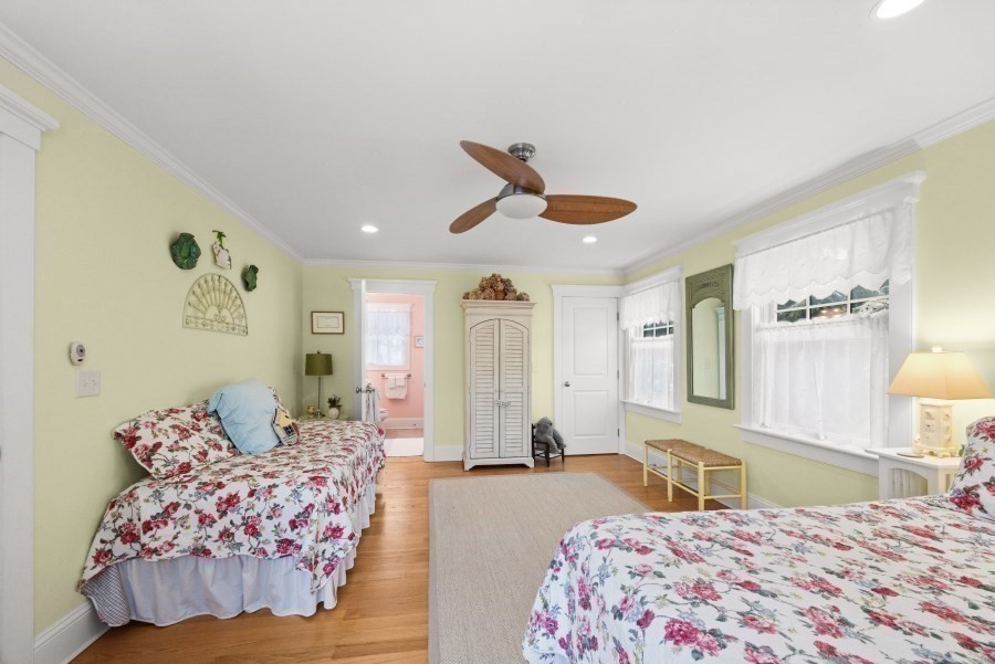 61 Causeway Road Tisbury, MA 02568 - Photo 29 of 42 a bedroom with a bed and dresser