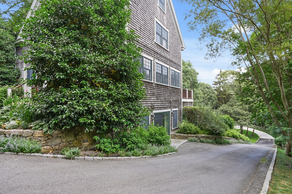 61 Causeway Road Tisbury, MA 02568 - Photo 3 of 42 a view of a garden with a house