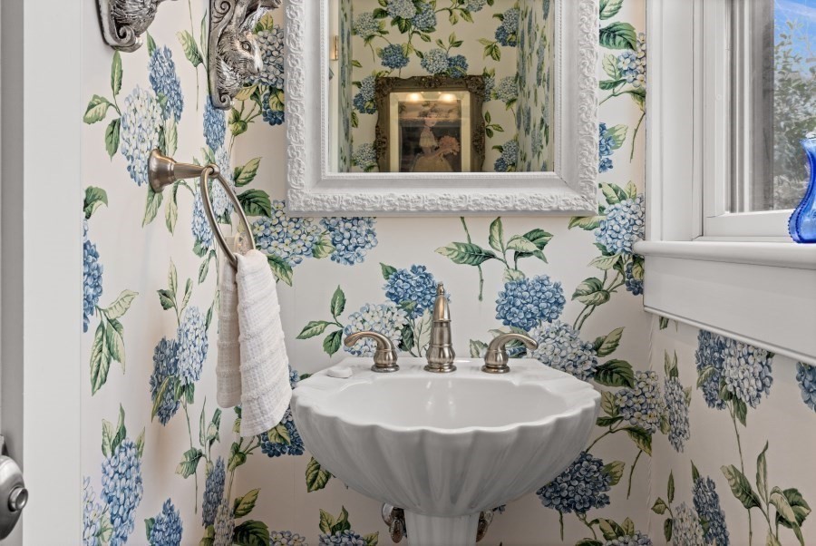 61 Causeway Road Tisbury, MA 02568 - Photo 32 of 42 a bathroom with a sink and a mirror