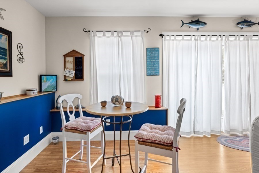 61 Causeway Road Tisbury, MA 02568 - Photo 38 of 42 a view of a dining room with furniture and a window