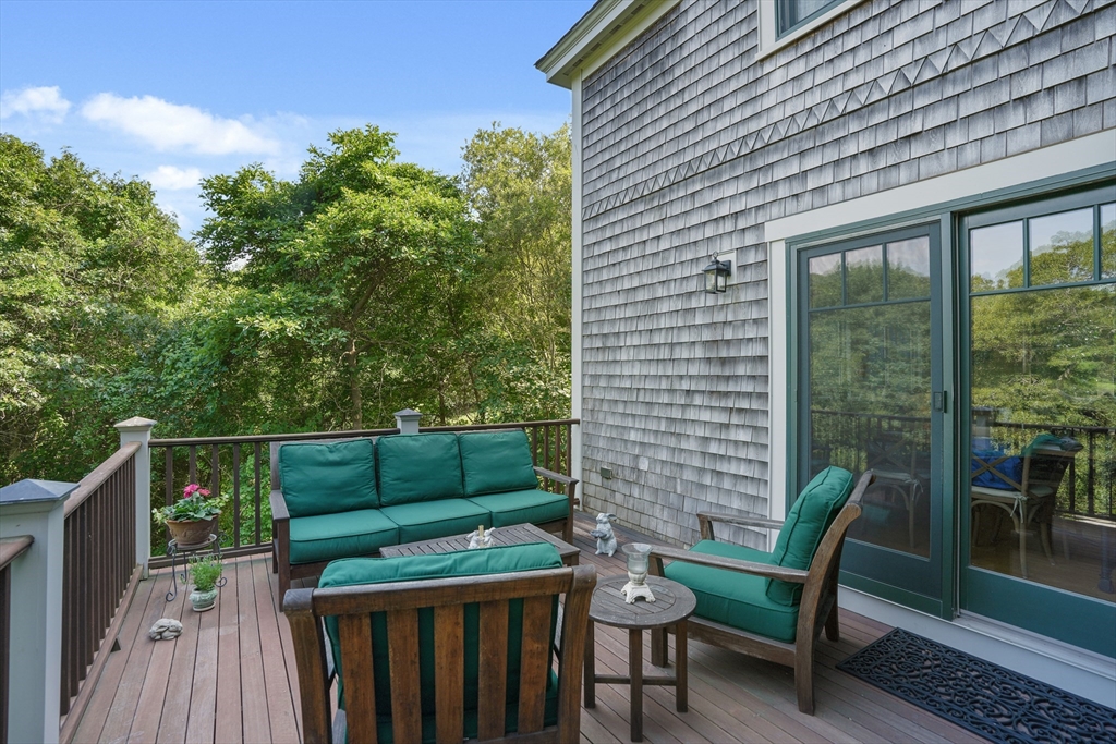 61 Causeway Road Tisbury, MA 02568 - Photo 5 of 42 a view of outdoor sitting area with furniture