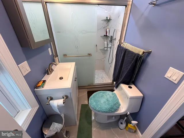 a room with furniture and wooden floor