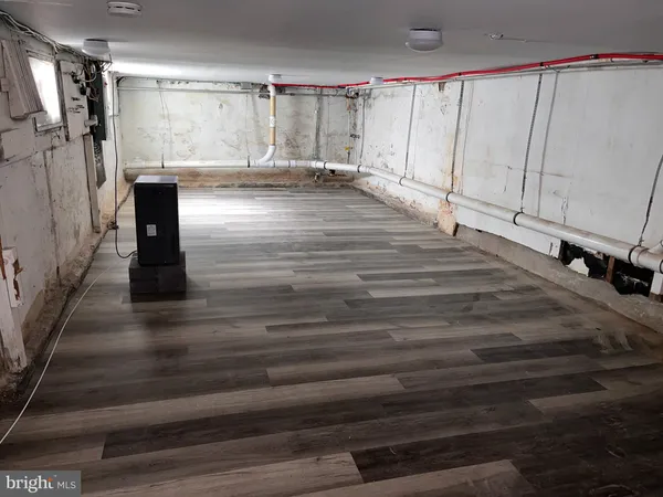 a view of a closet area with living room