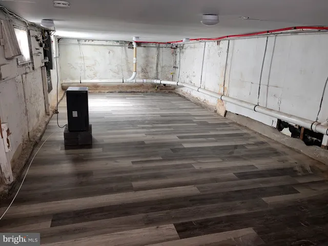 a view of a closet area with living room