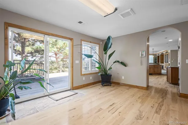 a view of an empty room and window