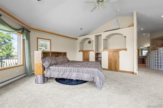 a bathroom with a granite countertop sink a large mirror and a bathtub
