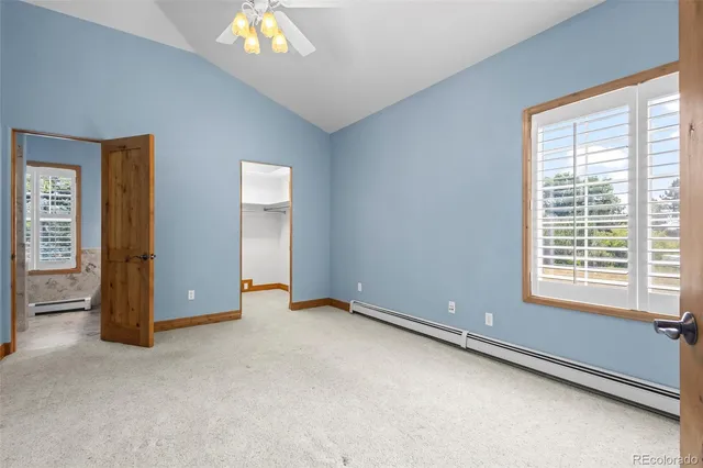 a view of large windows with wooden floor