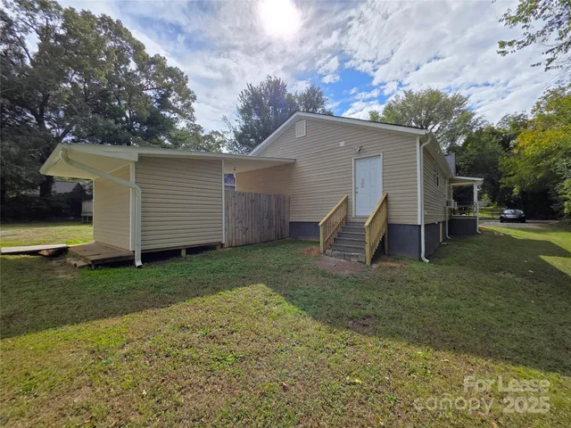 a view of a backyard with a garden