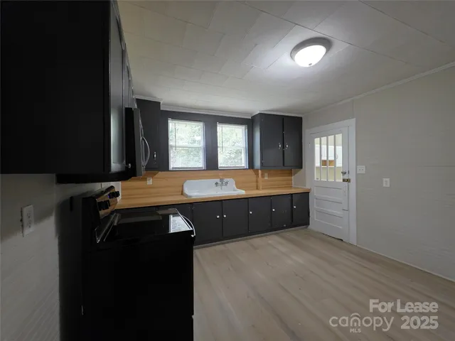 a bathroom with a double vanity sink and mirror