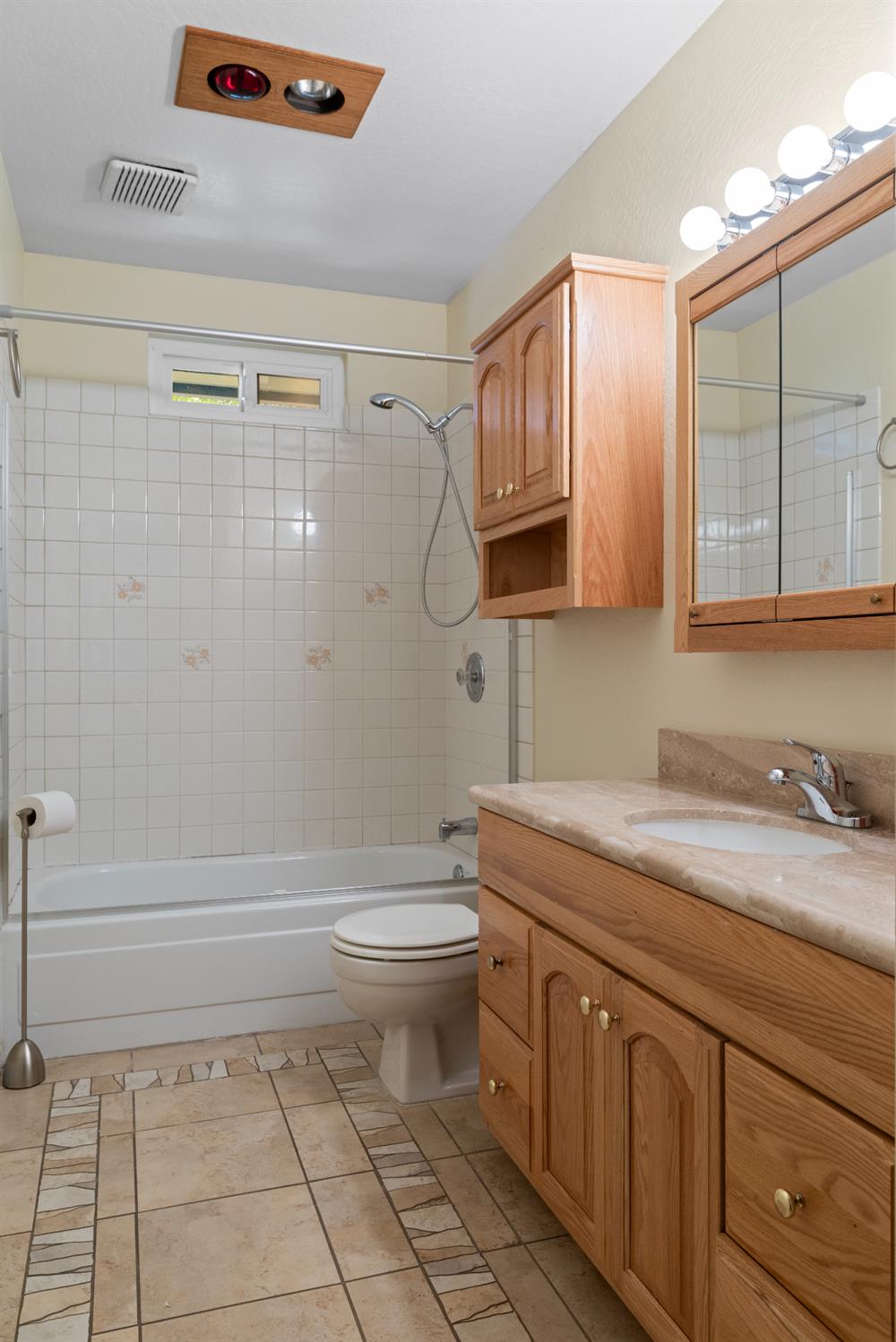 16173 Norlene Way Grass Valley, CA 95949 - Photo 24 of 25 a bathroom with a granite countertop sink a toilet and bathtub