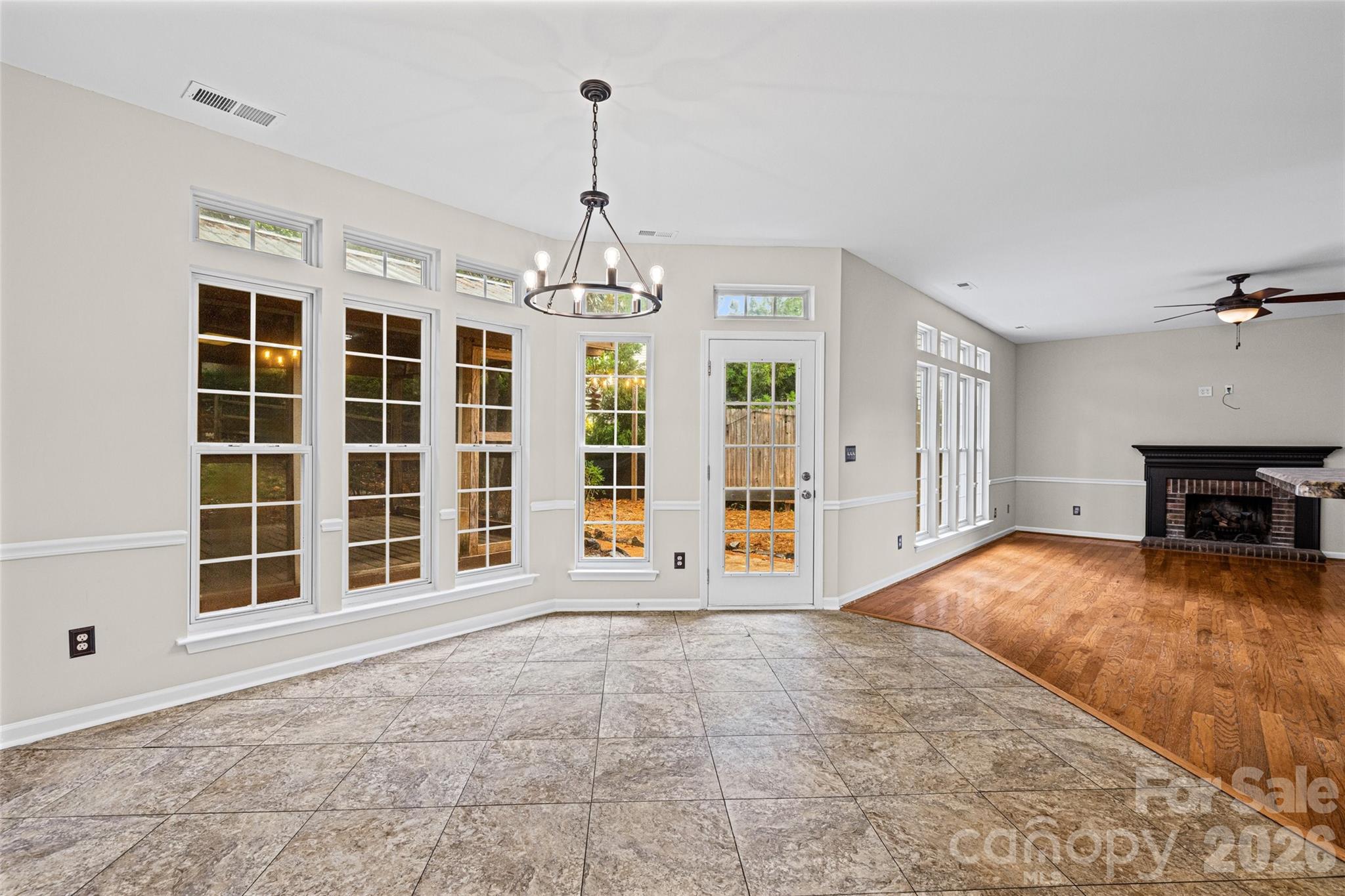 620 East Cheval Drive Fort Mill, SC 29708 - Photo 18 of 48 a view of an empty room with a window and fireplace
