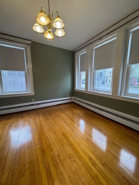 45 Broad Street, Unit 2 Salem, MA 01970 - Photo 13 of 16 a view of room with window and wooden floor